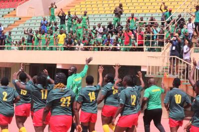 The Cameroon women's rugby team wave to the small crowd