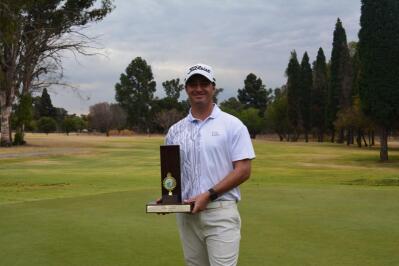 Golfer Jason Froneman with his trophy