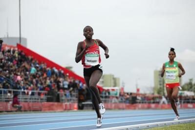A Kenyan runner leads a women’s race
