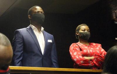 Shepherd Bushiri and his wife Mary stand in court.