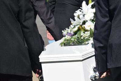 Pallbearers carrying a coffin