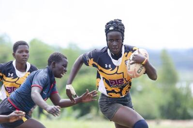 Uganda women's rugby players in action
