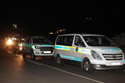 Convoy of police vehicles.