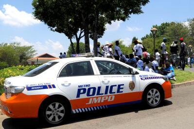 A marked Johannesburg Metro Police Department Toyota Corolla 