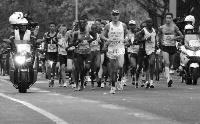 A group of runners competing in a road race
