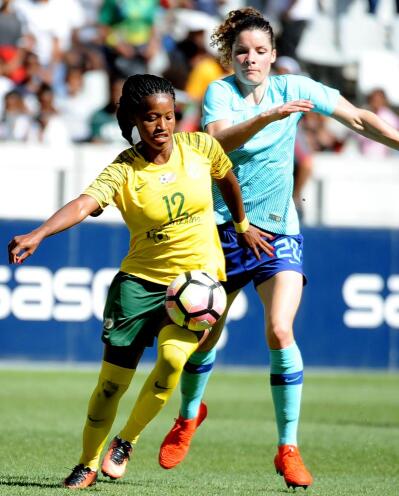Banyana Banyana player Jermaine Seoposenwe and Netherlands player Dominique Bloodworth compete for the ball