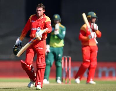 Zimbabwean batsman Sean Williams walks off after being dismissed against South Africa