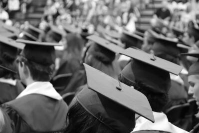 University graduates wear graduation caps.