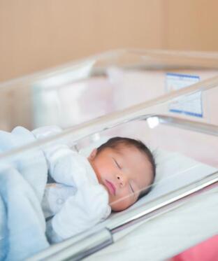 A newborn baby in the nursery.