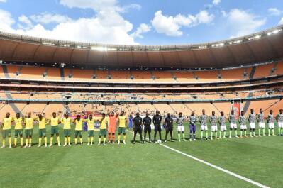 South Africa and Nigeria line up for the national anthems during the Africa Cup of Nations (Afcon) qualifier at the FNB stadium